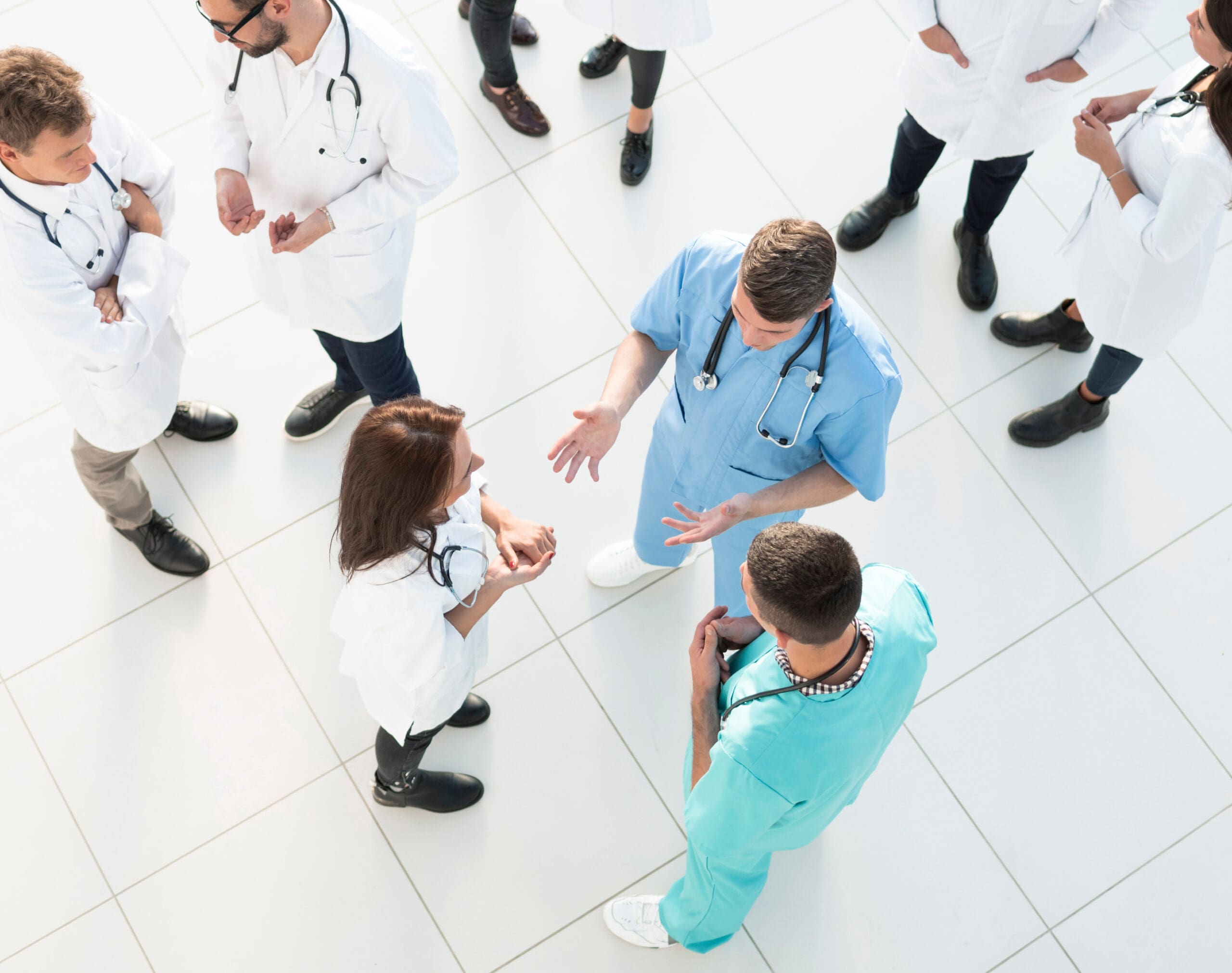 overhead photo of medical professionals talking