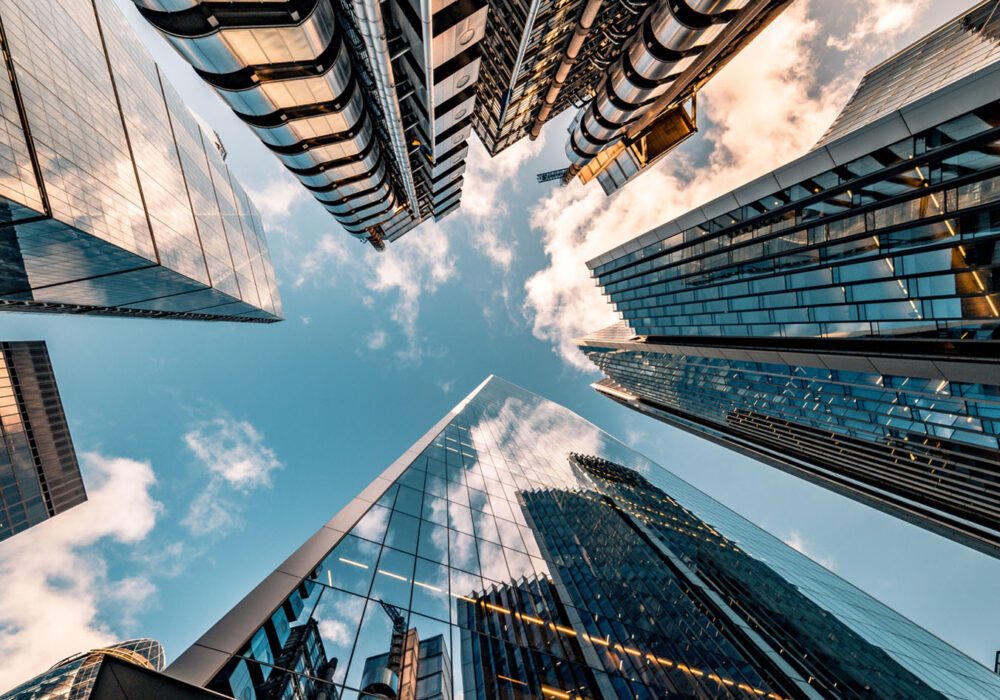 Looking Directly Up At The Skyline Of The Financial District In Central London Stock Image photo of the sky in a city with buildings rising from all sides