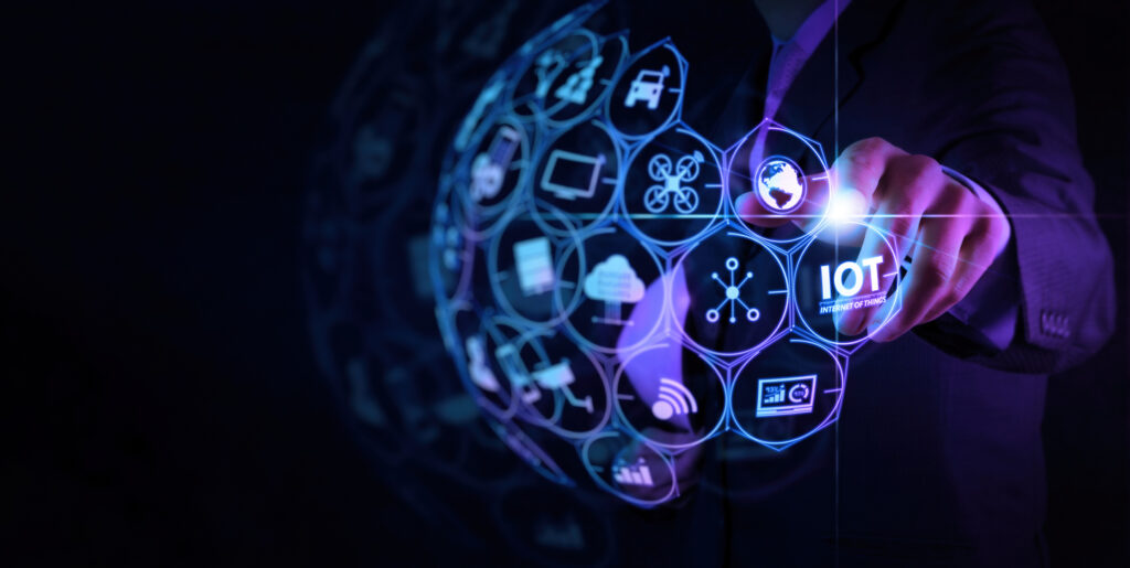 Digital Transformation,IOT Internet Of Things Digital Transformation Modern Technology Concept Businessman Select The Abstract Chip With Text IoT On The Virtual Display On Virtual Screen.