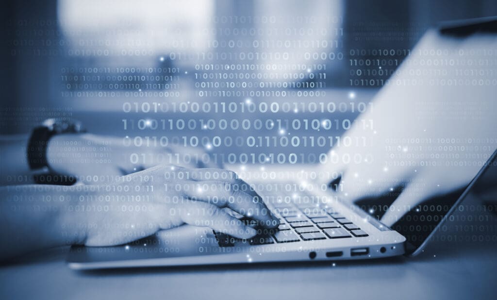 Businessman hand touch with Code html and programming on screen laptop,Programmer development Computer code,web design coding technology in software, digital software technology development, IoT