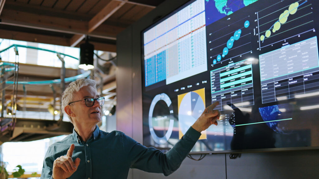 Enterprise PKI, man conducting lecture about security on screen