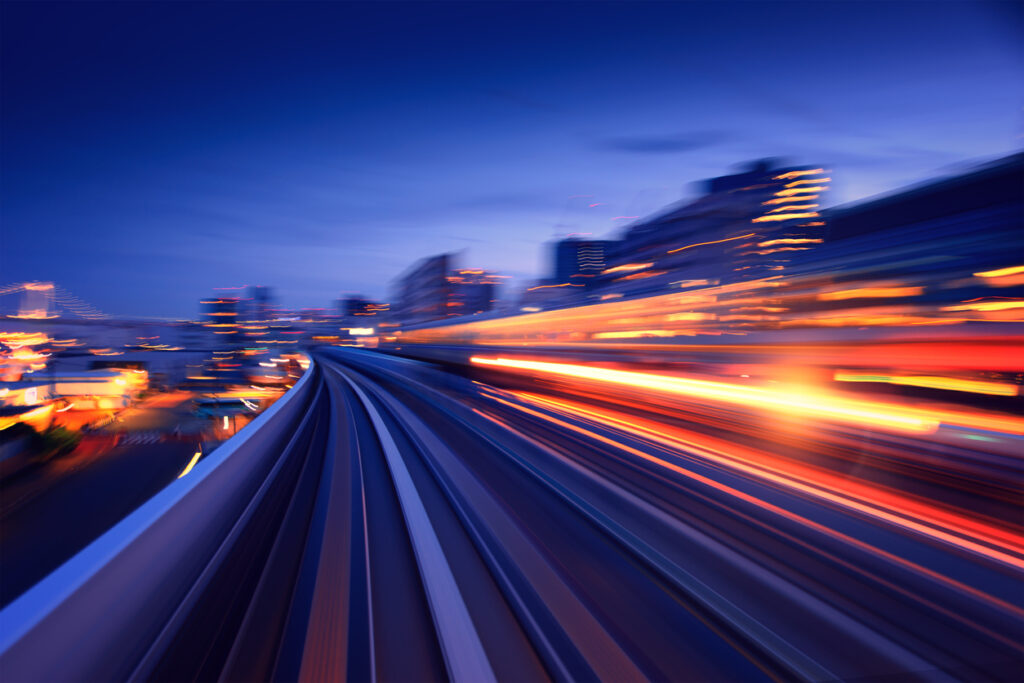 Light Trails On Road In City At Night
